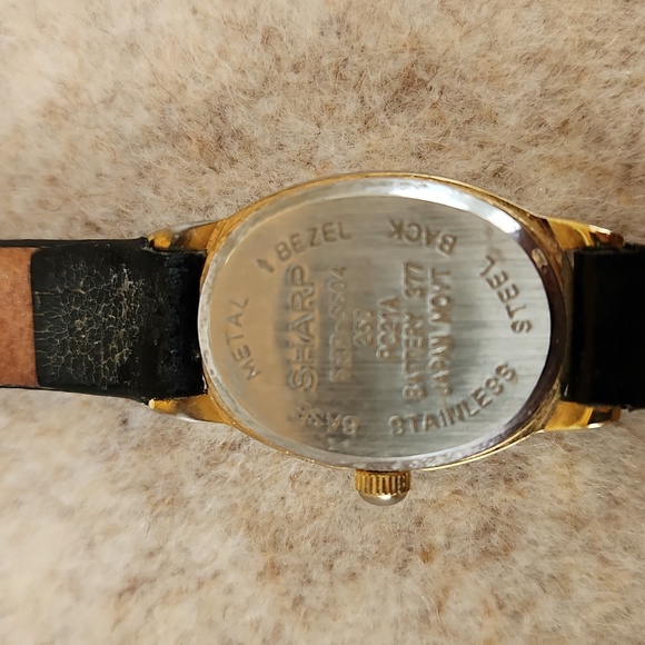 Watch by Sharp womens thin band battery watch. Delicate oval face and 14\